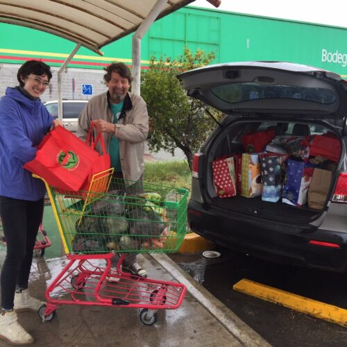 Fred Worley shops food donations for Casa Bethesda orphanage