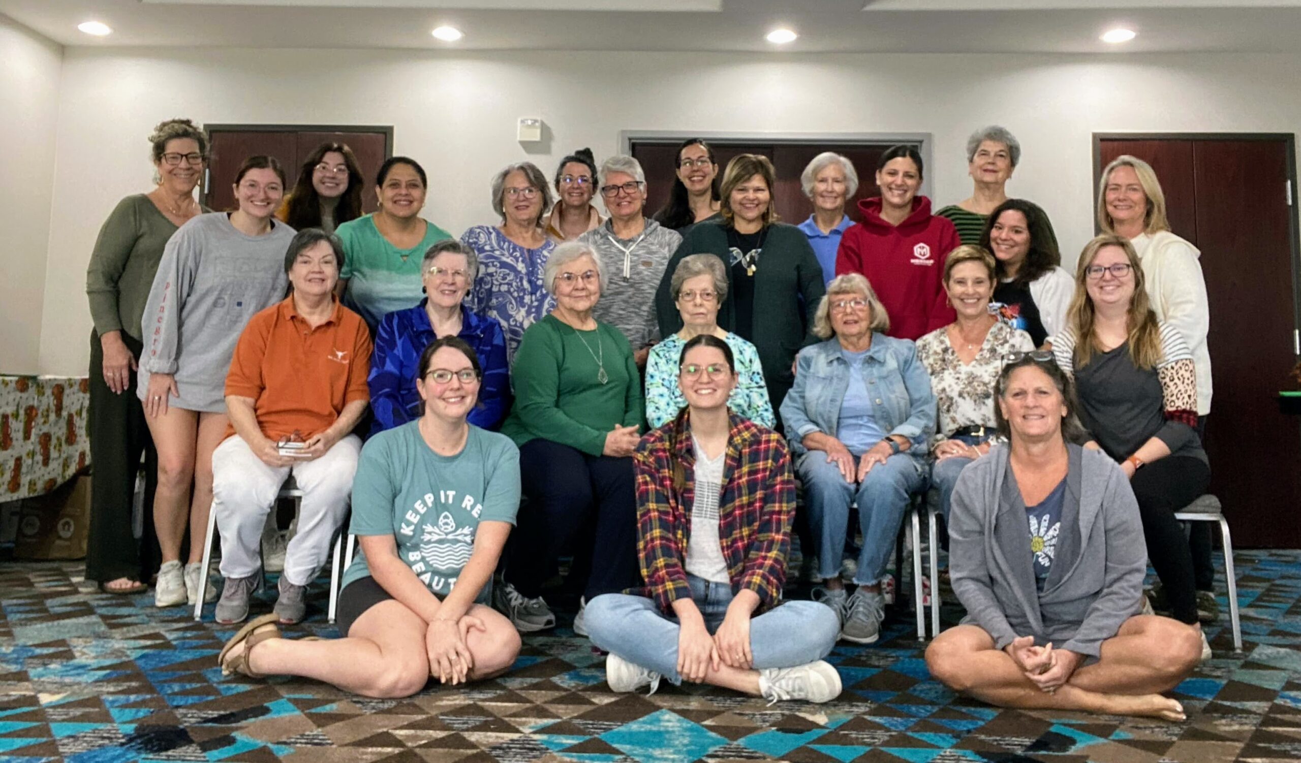 Womanfest 2024 Womanfest Attendees pose for a picture together